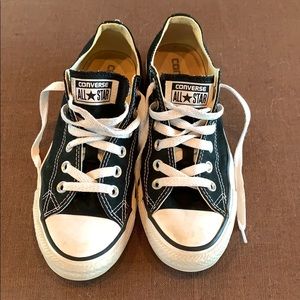 Black low top Converse.